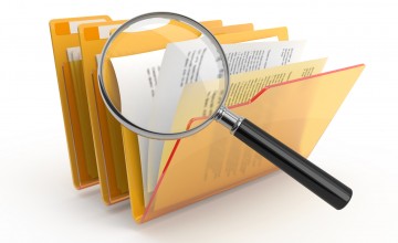 Files with magnifying glass