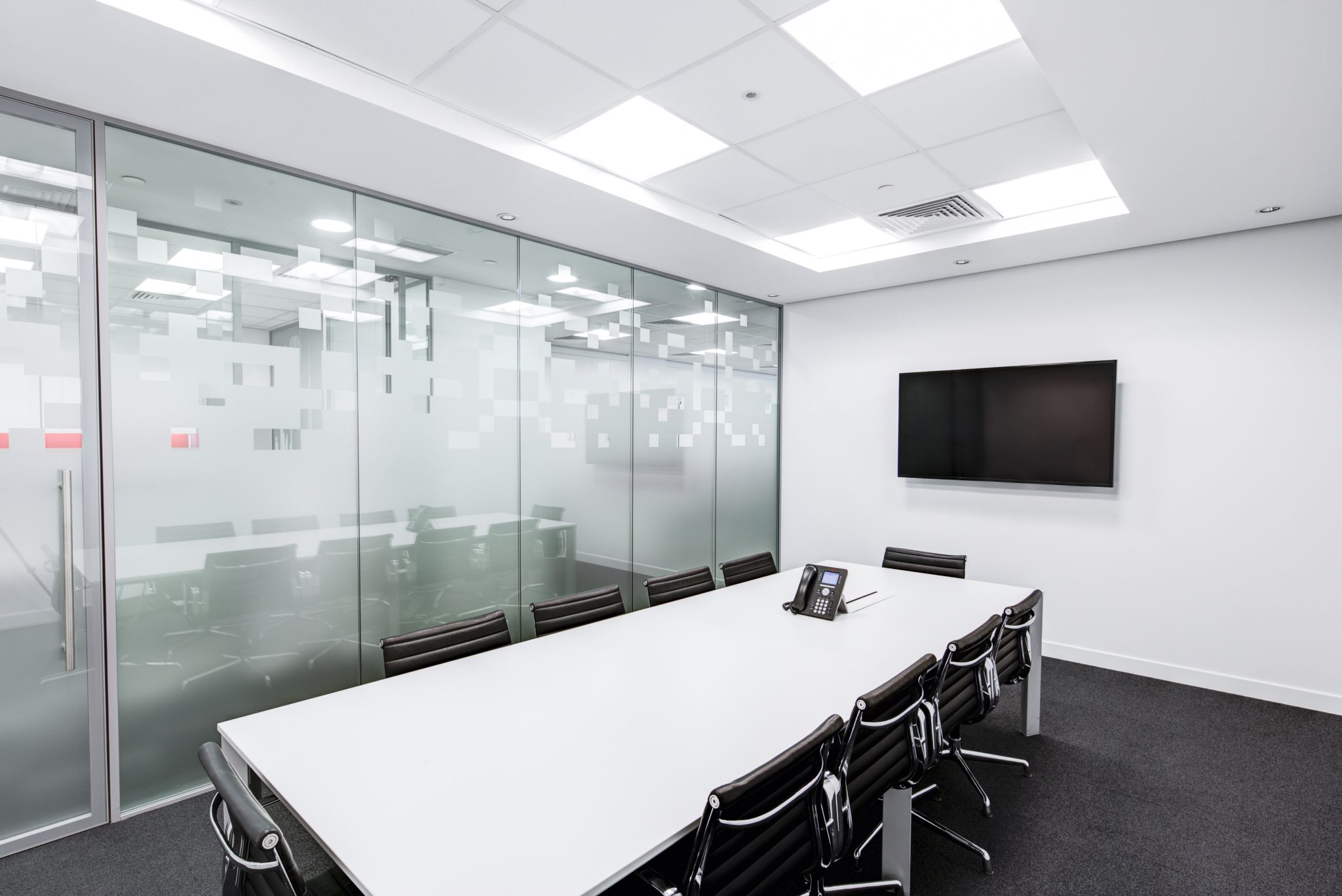 A photo of an empty boardroom business meeting room.