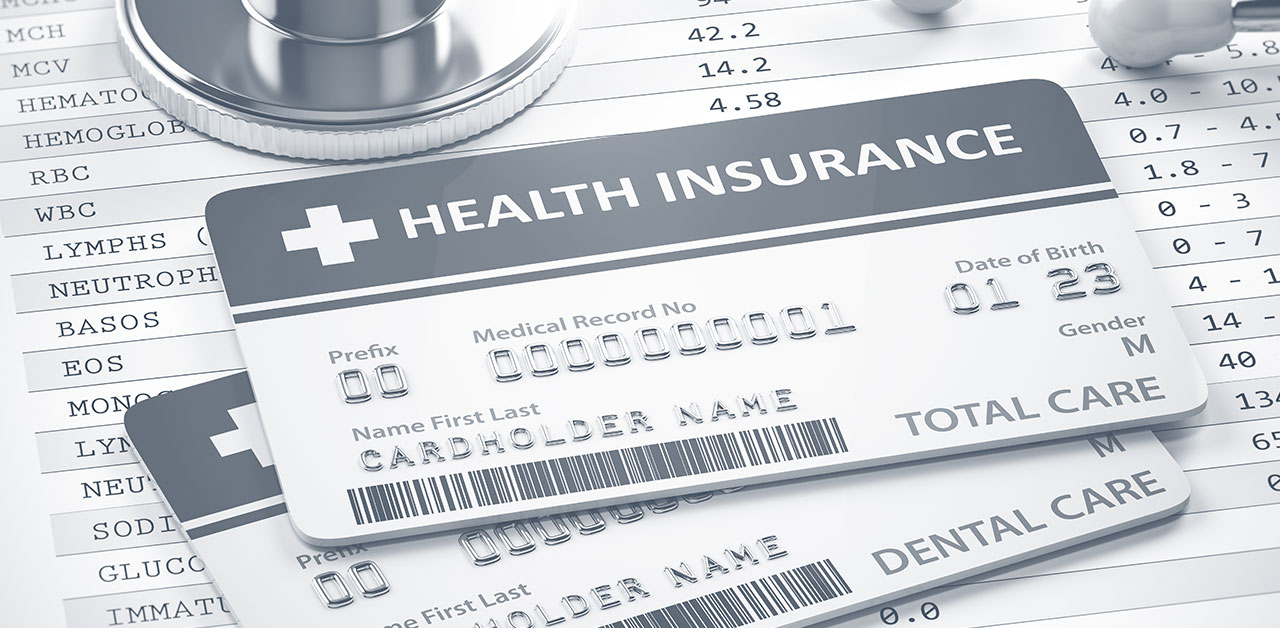 A photo of a card that says "Health Insurance".